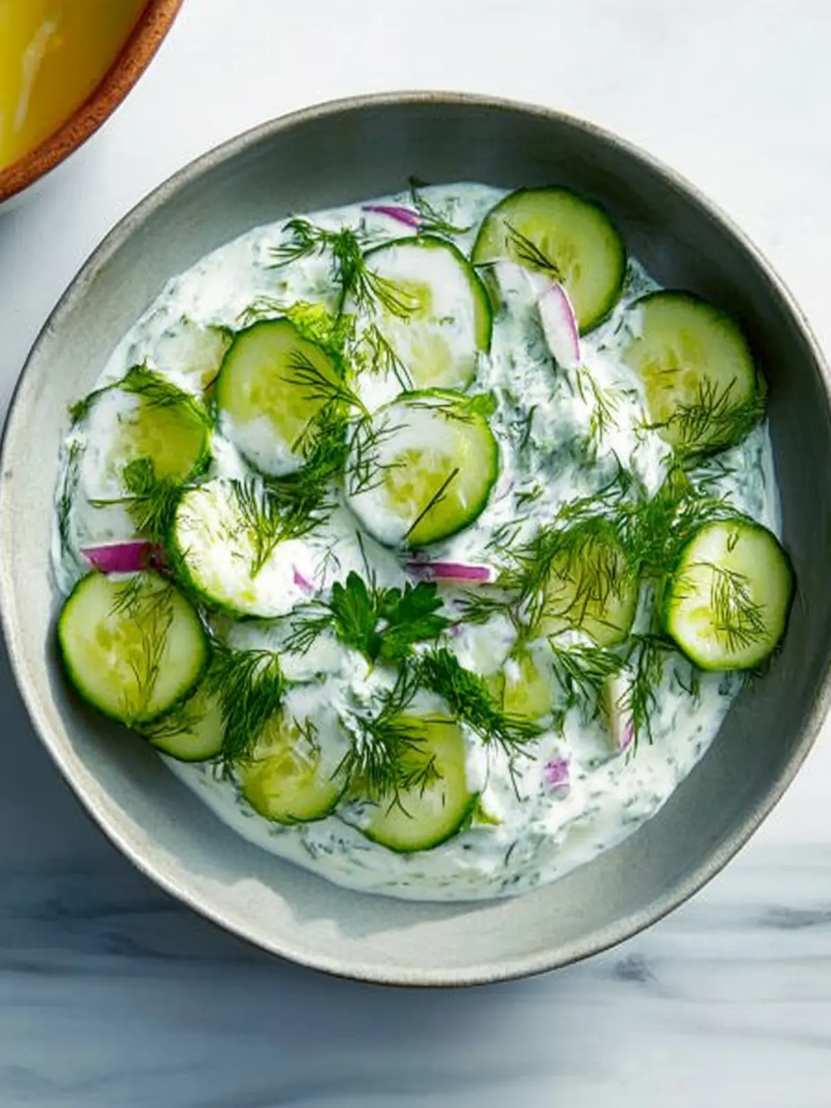 Herbed Cucumber-Yogurt Salad: Summer's Refreshing Delight 4 Herbed Cucumber-Yogurt Salad